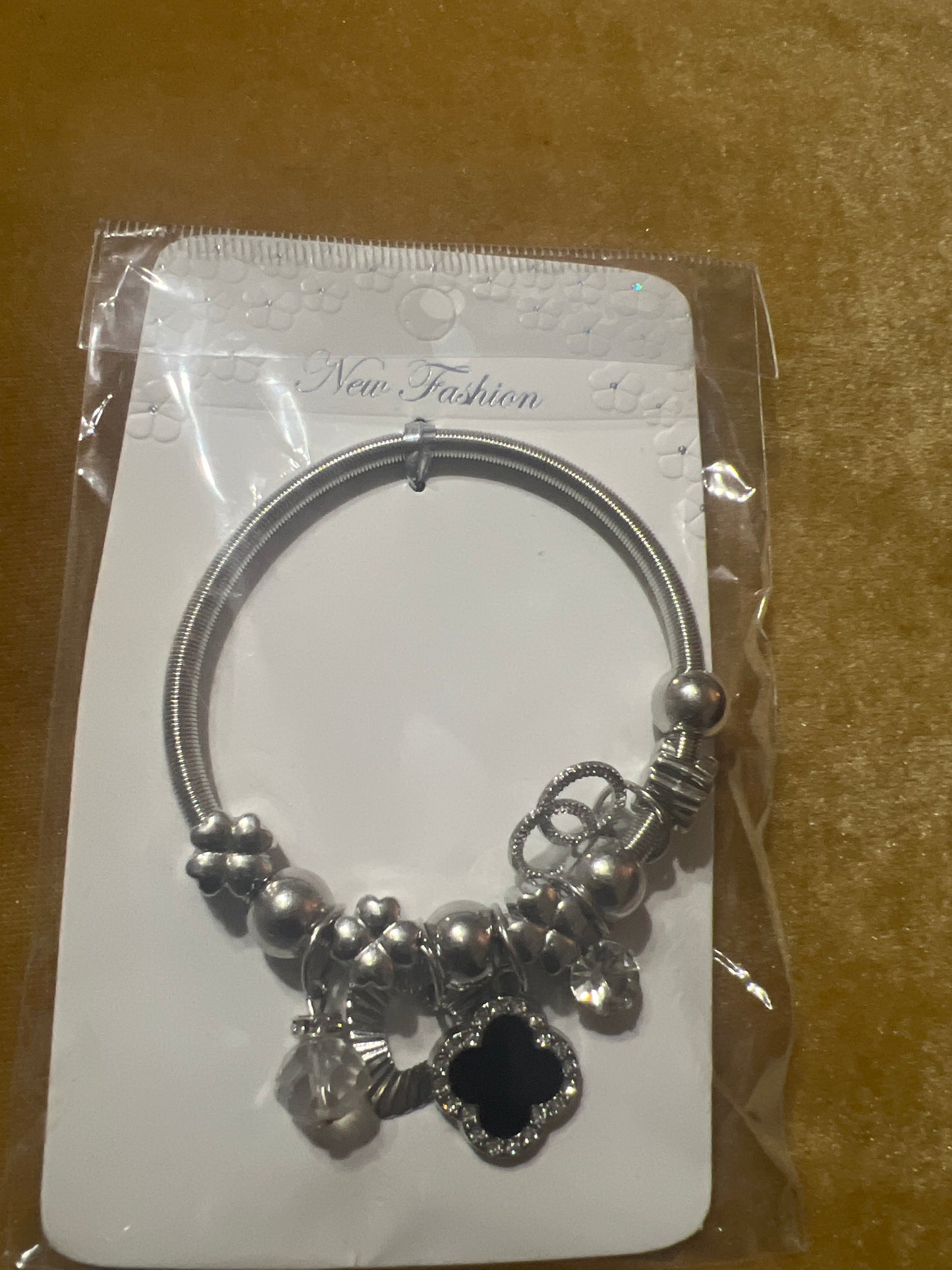 Silver & Black Clover Coil Bangles